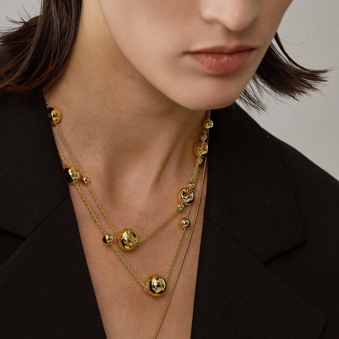 Dented Gold Sphere Long Necklace